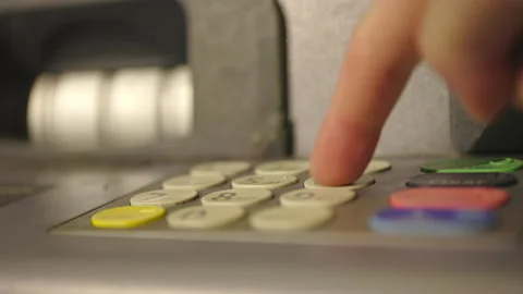 Person enters their secret code at ATM 4k Stockbeeldmateriaal 159903651
