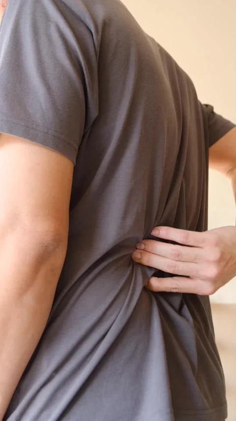 Person Experiencing Backache Discomfort Stock Footage 297340457