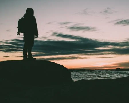 Person exploring the ocean view. Stock Photos