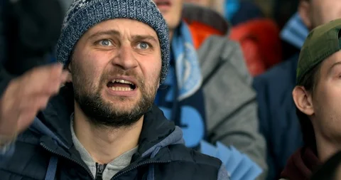 Person expressive face grabs head lose team close up bad emotion fan of goal. Video stock 121171875