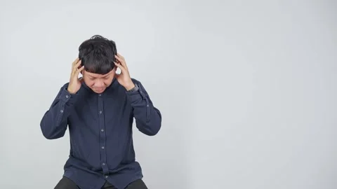 Person Feeling Extremely Stressed While Covering Face Stock Footage 344830952
