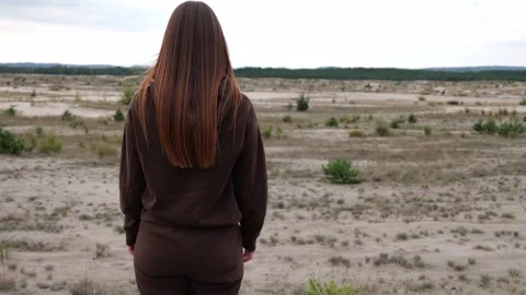 Person in a field Stock Footage 252084623