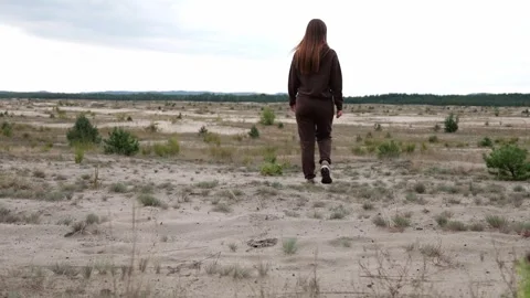 Person in a field Stock Footage 252086029