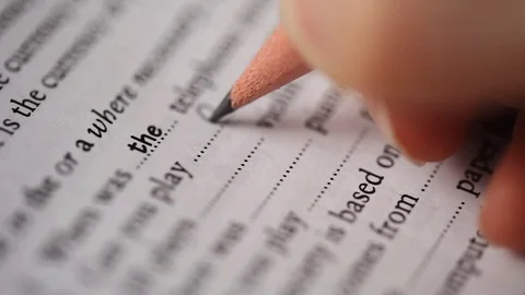 Person filling in exercise Stock Footage 70593748