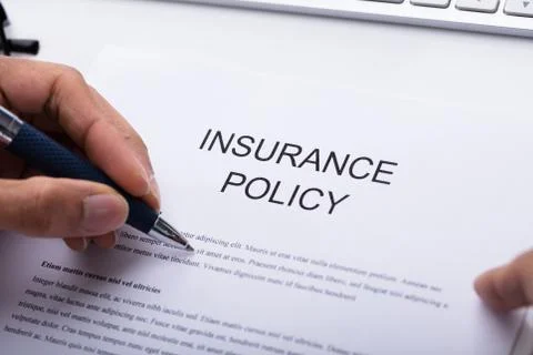 Person Filling Insurance Policy Form Stock Photos
