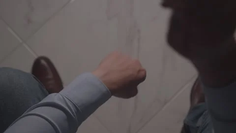 Person Flipping a Coin While Seated Stock Footage 279106439