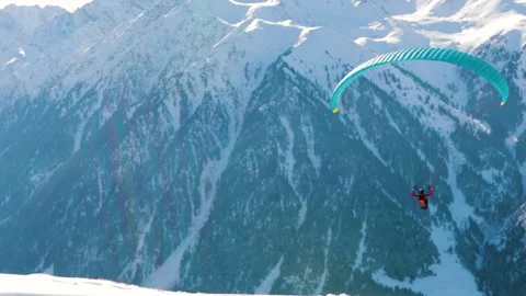 Person flying with parachute 스톡 동영상 240330287