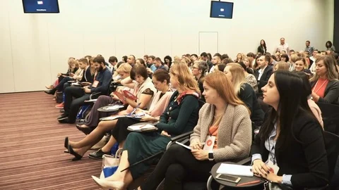 Person on the forum to solve economic issues of our time and see problem. Woman Stock-Footage 70088578