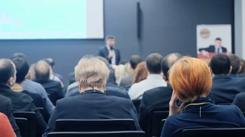 Person on the forum to solve economic issues of our time and see problem Stock-Footage 71735415