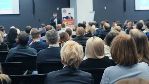 Person on the forum to solve economic issues of our time and see problem Stock-Footage 71737874