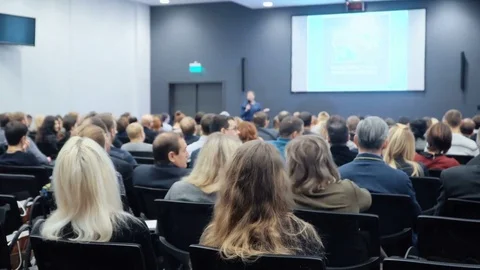 Person on the forum to solve economic issues of our time and see problem Stock-Footage 71738624