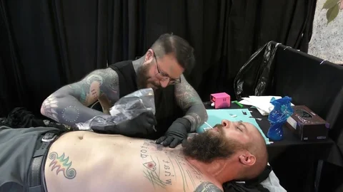 A person get a tattoo 스톡 동영상 70474048