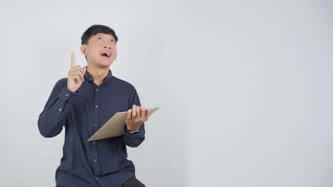 Person Getting New Idea While Pointing Upward Stock Footage 344830822