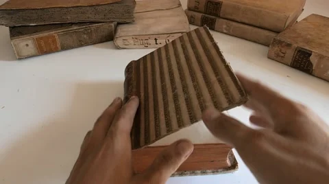 Person with gloves checking an book Stock Footage 53475935