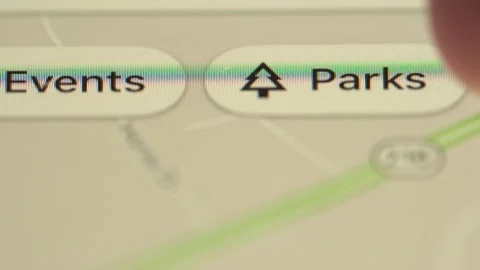 A person goes through the list of facility options on Google Maps app on Stock Footage 133595260