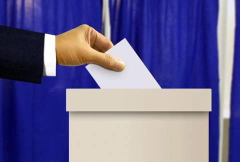 Person hand casting a vote Stock Photos
