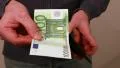 Person handing money HD Footage