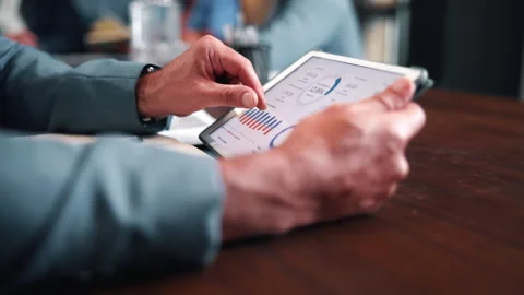 Person, hands and analytics with tablet screen in office for performance review Video stock 338005165