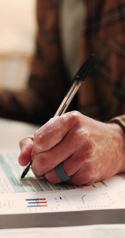 Person, hands and writing with documents for finance review, investment contract Stock Footage 339158270