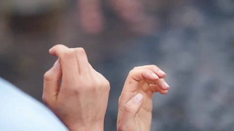 Person hands gesturing in forest Stock Footage 107578429