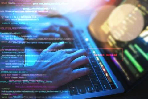 Person hands, laptop or coding in night office on typing iot website code or Foto stock