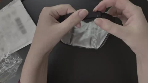 Person hands unpack and demonstrate the parcel. Video stock 205956877