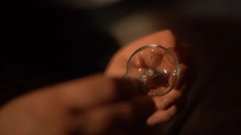 Person having light bulb in it hamds Video stock 162891582
