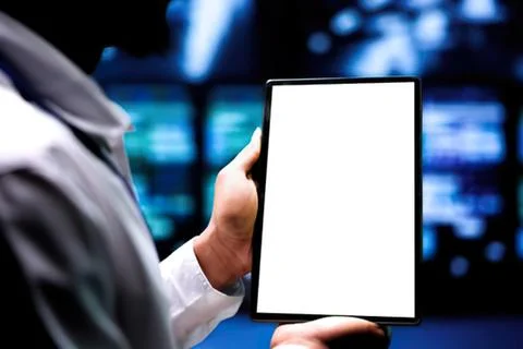 Person holding blank tablet in tech office Stock Photos