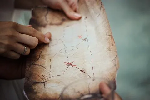 Person Holding Brown Map Stock Photos