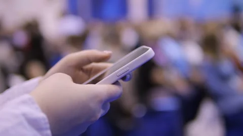 A person is holding a cell phone Stock Footage 297650358