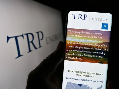  Person holding cellphone with webpage of US oil and gas company TRP Energ... Stock Photos