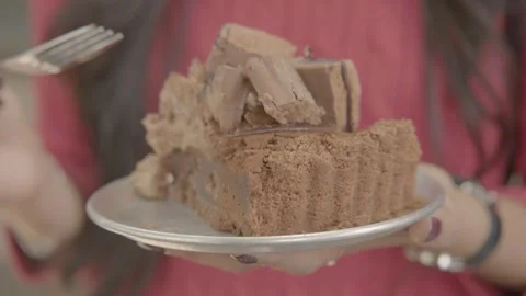 Person Holding Chocolate Dessert Slice on Plate in Sydney Cafe Close-Up Stock Footage 345666757