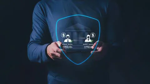Person holding digital shield with security and finance icons Stock Photos