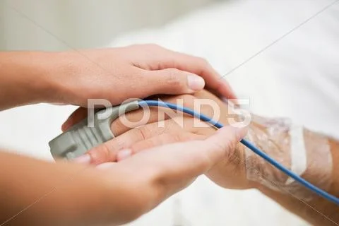 Person Holding Hospital Patient?s Hand