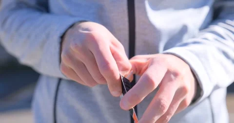 Person holding a micro SD memory card in their hand Stock Footage 331947586