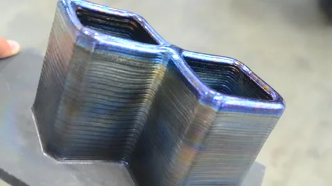 Person holding object printed 3D printer metal Additive manufacturing solution Stock Footage 278096853