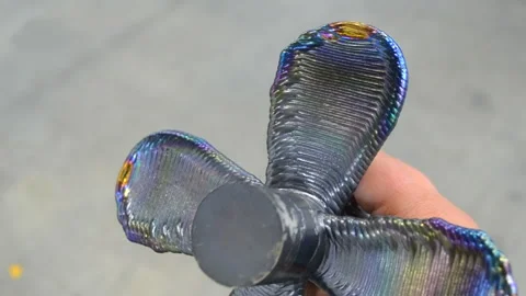 Person holding object printed 3D printer metal Additive manufacturing solution Stock Footage 278185145