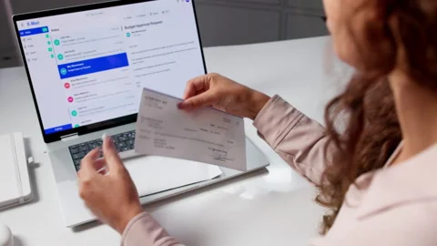 Person Holding A Paycheck Envelope After Receiving Payment Stock Footage 336376861