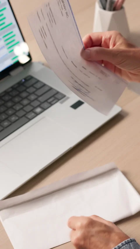 Person Holding Paycheck Envelope, Receiving Payment Stock Footage 337636516