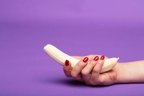 Person holding a slice of bread Stock Photos