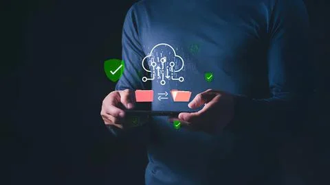 Person holding smartphone with cloud technology icons Stock Photos