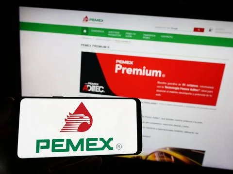  Person holding smartphone with logo of oil company Petroleos Mexicanos (P... Stock Photos