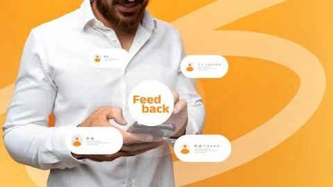 Person holding smartphone while reading feedback on screen Stock Photos