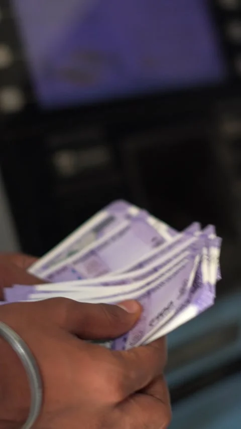 Person Holding Stack of Indian Currency Notes Financial Close-Up Stock Footage 333069991