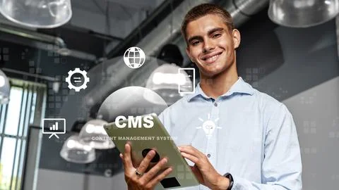Person holding tablet while showing interest in a content management system Stock Photos