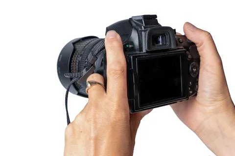 Person holds a camera preparing to take a picture in a studio or outdoor lo.. Stock Photos
