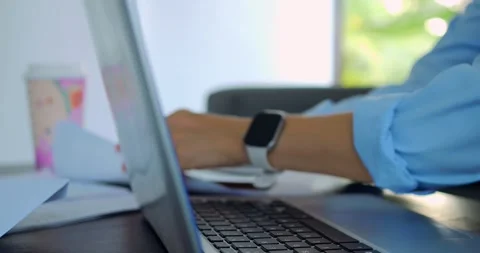 Person inputs data precisely. Data professional diligently analyzes numbers with Stock Footage 344740306