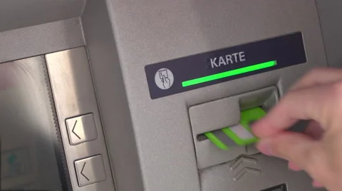 Person inserting and removing debit card from ATM 4k Stock-Footage 68300706