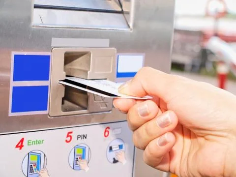 Person inserting a card into a vending machine Stock Photos