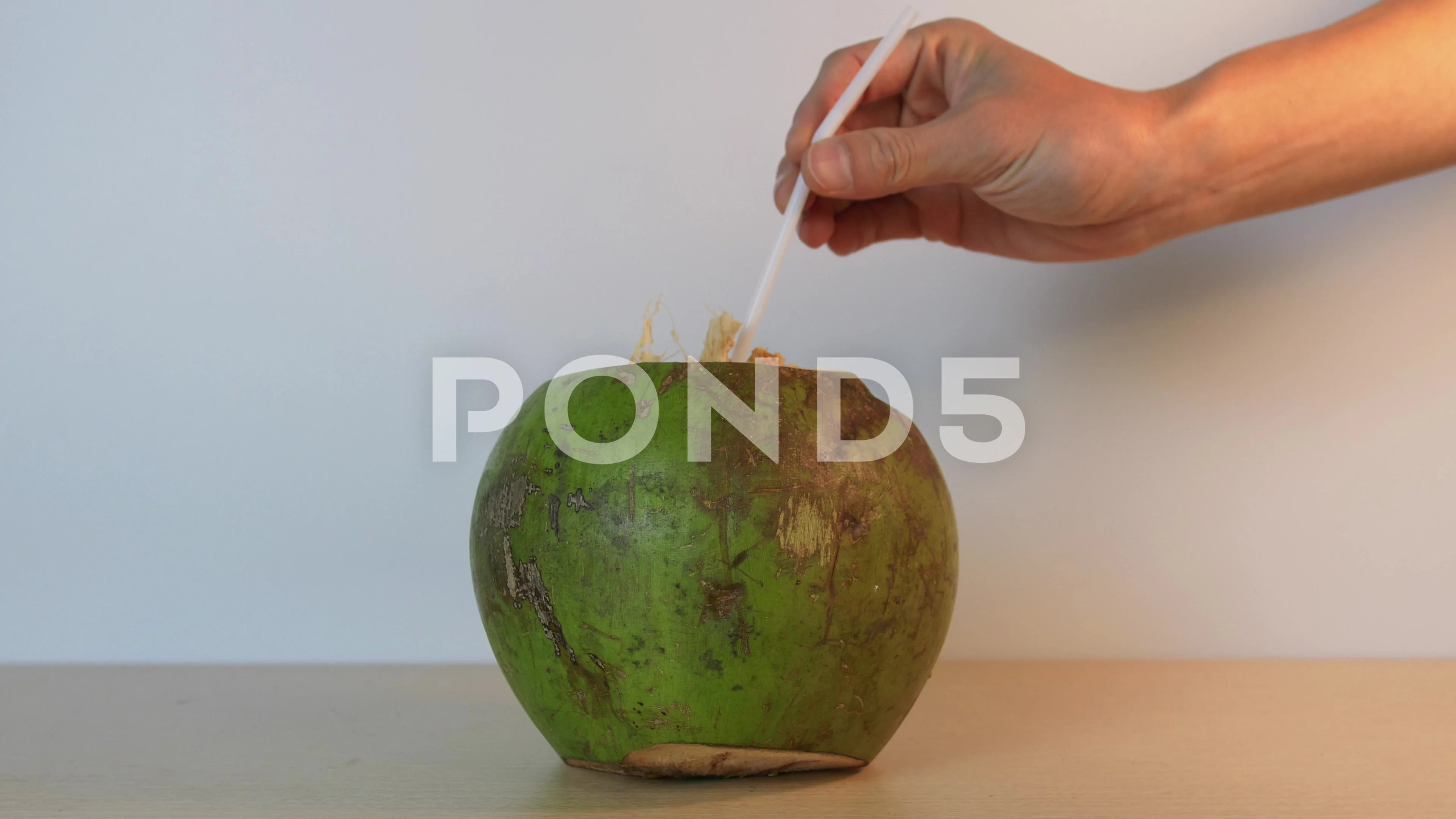 coconuts with a bendy straw